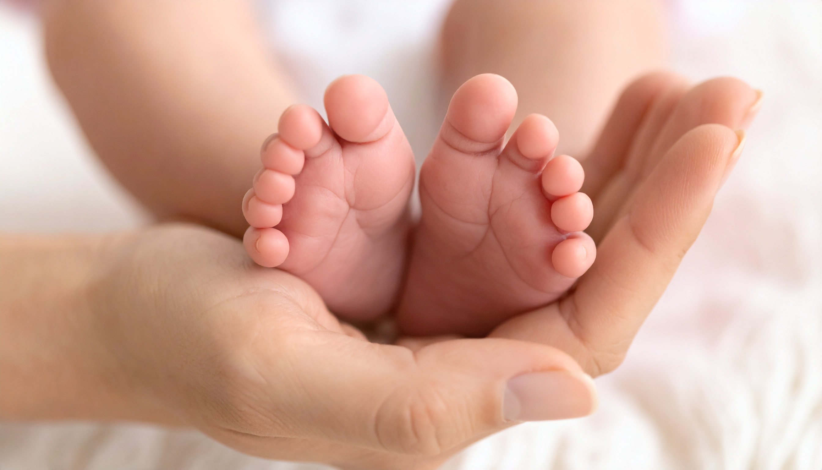 Happy family with newborn
